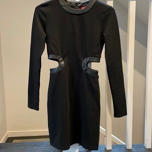 Staud Dolce black long sleeve mini dress.